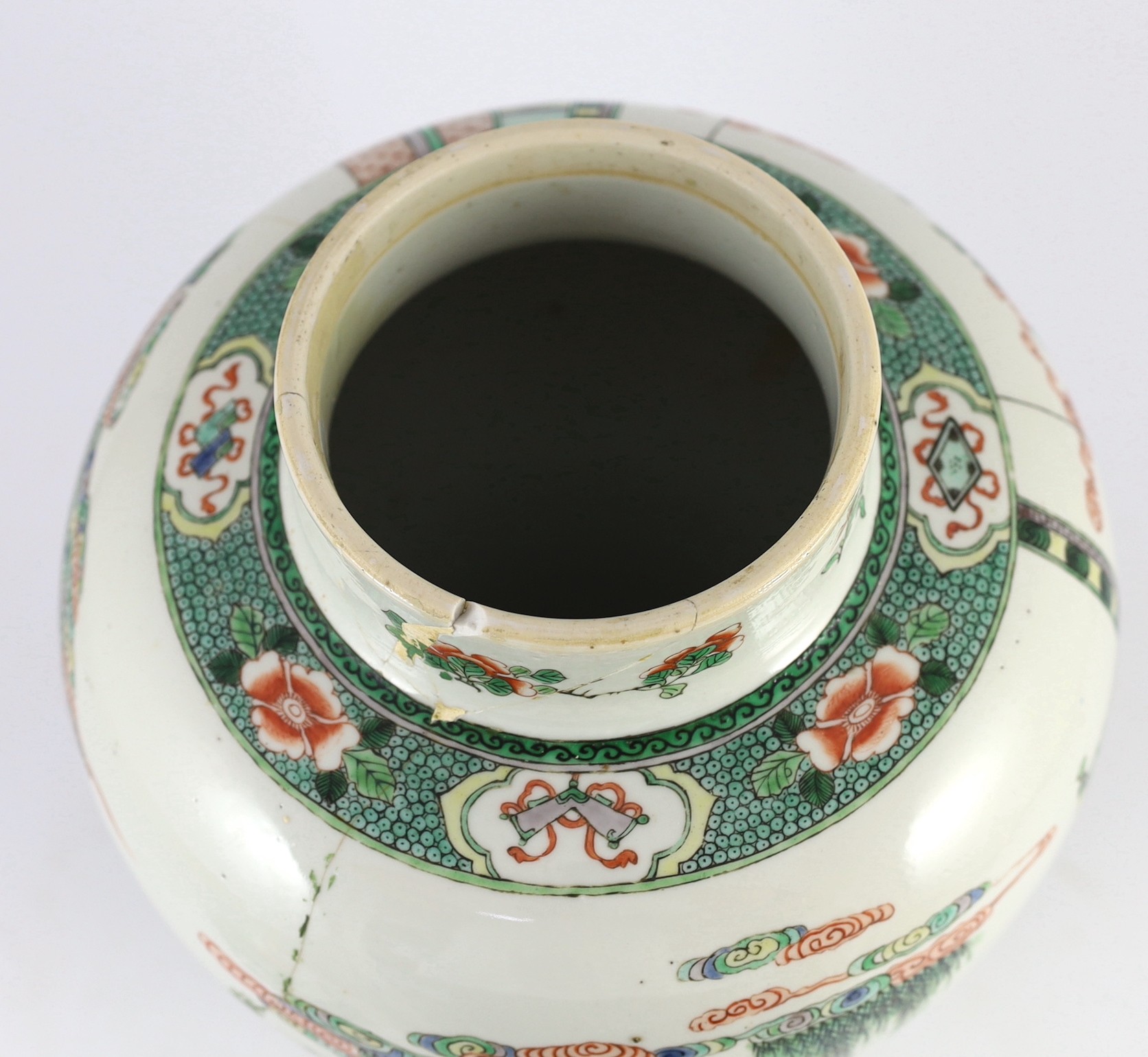 A Chinese famille verte jar and associated cover, 19th century, 41cm high, damaged and matched cover